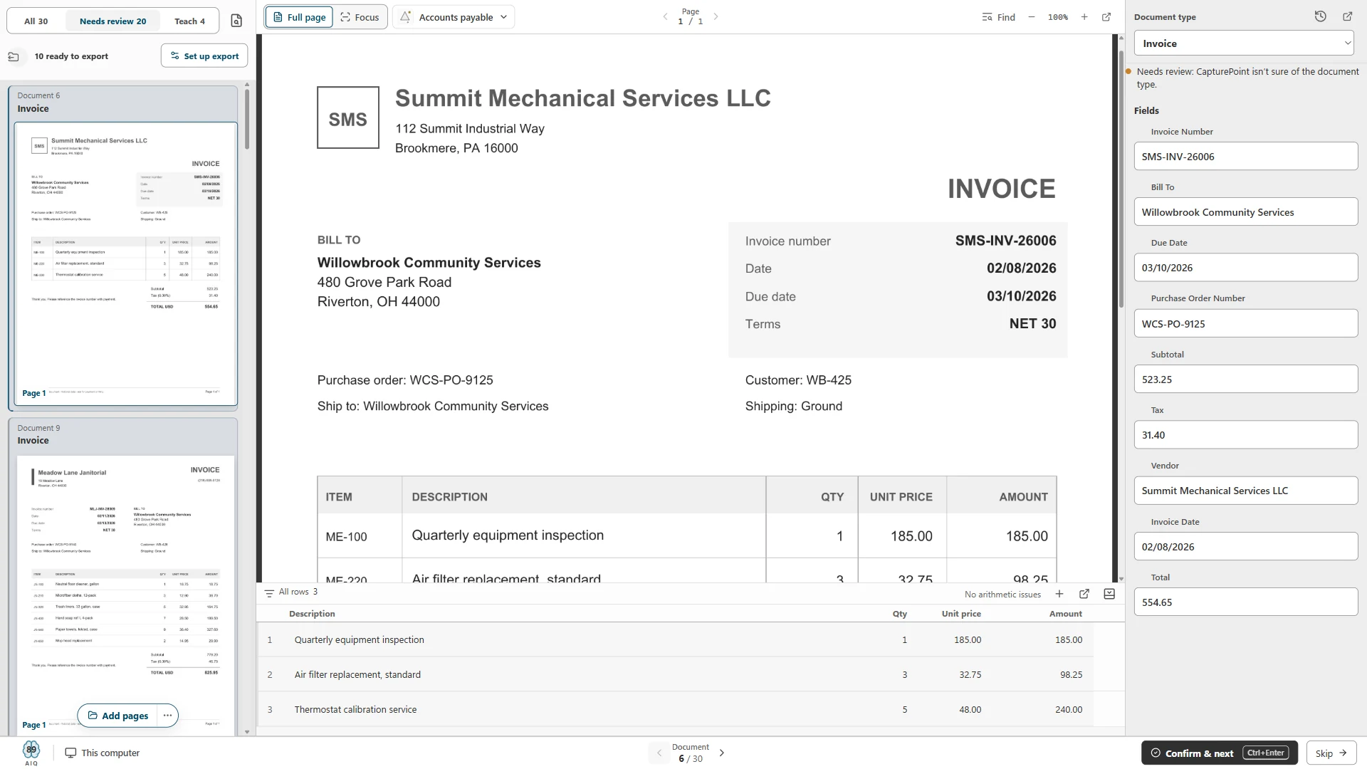 Review screen with an invoice's fields and line items beside the page, and the reason it needs review
